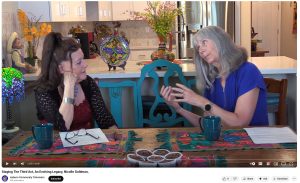 two women talking on the set of Staging the Third Act as host Jeaninne Escallier Kato interviews author Nicolle Goldman for ACTV